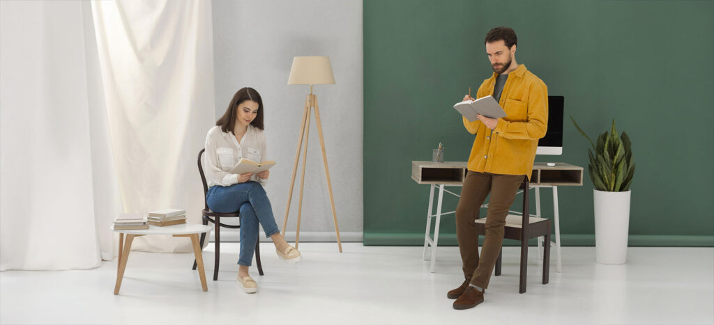 man woman reading books hero